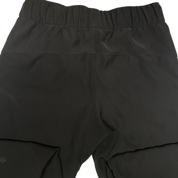 LULULEMON On The Fly Crop Woven Black Pants Size 4 - Picture 9 of 14